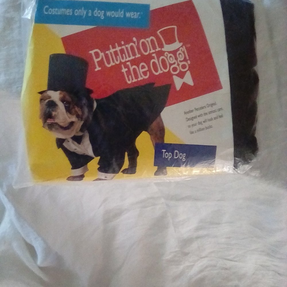 New in package. Dog tuxedo tux costume